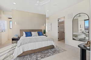 Bedroom featuring light tile patterned flooring, baseboards, visible vents, and recessed lighting