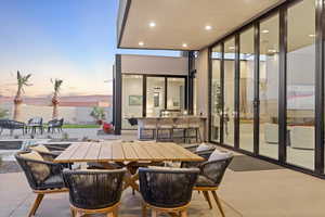 View of patio featuring outdoor dining area