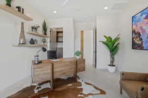 Office featuring recessed lighting and visible vents