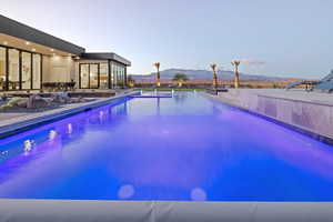 Outdoor pool with a mountain view