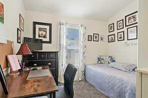 Bedroom featuring carpet floors