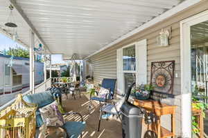 View of patio with a porch