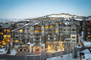 Exterior space featuring a residential view and a mountain view