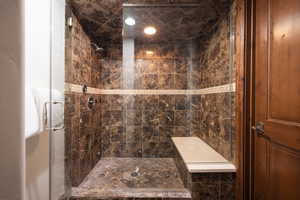 Full bathroom featuring a stall shower