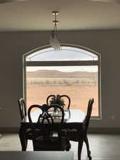 Dining area featuring light wood finished floors and baseboards
