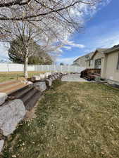 View of yard with a patio and a fenced backyard