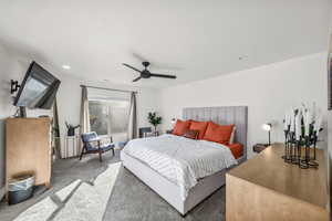 Bedroom with carpet flooring and a ceiling fan