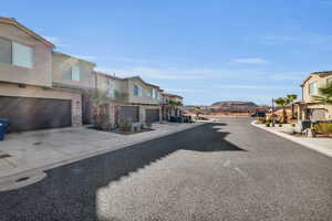 View of street featuring a mountain view and a residential view