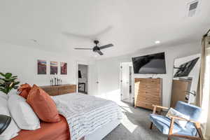 Bedroom with carpet, visible vents, ceiling fan, and recessed lighting