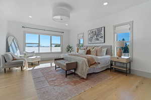 Bedroom featuring recessed lighting, baseboards, and light wood finished floors