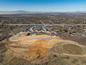 Birds eye view of property featuring a mountain view