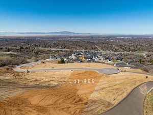 Birds eye view of property with a mountain view