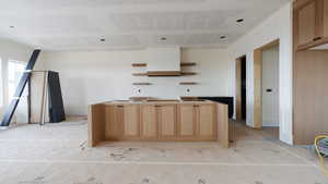 Kitchen with open shelves and a kitchen island