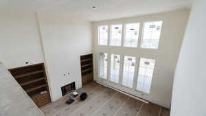 Unfurnished living room with light wood-style flooring