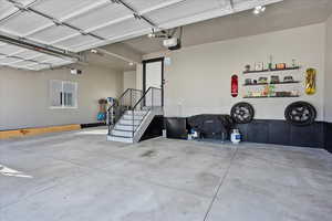 Garage featuring a garage door opener