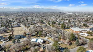 Drone / aerial view with a residential view and a mountain view