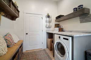 Laundry area featuring washer / dryer and laundry area