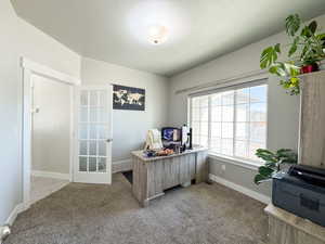 Office featuring carpet floors and baseboards