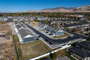 Drone / aerial view featuring a residential view and a mountain view