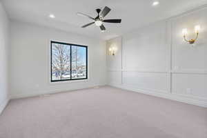 Primary bedroom featuring ceiling fan, recessed lighting and Ensuite bath with custom closet.