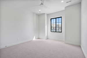 Bedroom with recessed lighting, ceiling fan, and baseboards