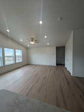 Unfurnished room with a ceiling fan, recessed lighting, baseboards, visible vents, and wood finished floors