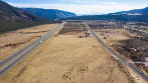 Aerial view featuring a mountain view and a rural view