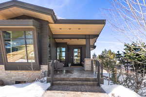 View of snow covered property entrance