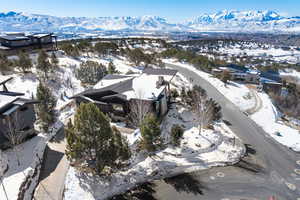 Snowy aerial view with a mountain view