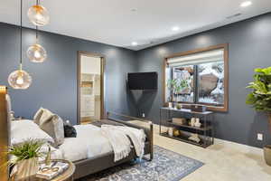 Bedroom with light carpet, recessed lighting, visible vents, and baseboards