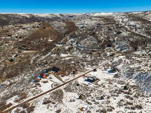 Snowy aerial view with a mountain view