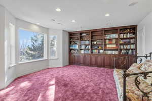 Unfurnished room with carpet floors, baseboards, a textured ceiling, and recessed lighting