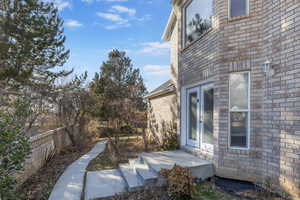 View of yard featuring fence