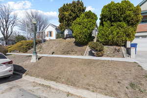 View of yard featuring a garage