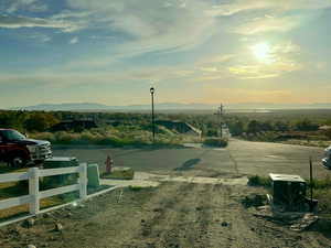View of road with street lights and a mountain view