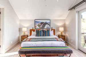 Carpeted bedroom with lofted ceiling, access to outside, and baseboards