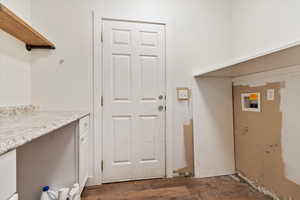 Laundry room featuring washer hookup and laundry area