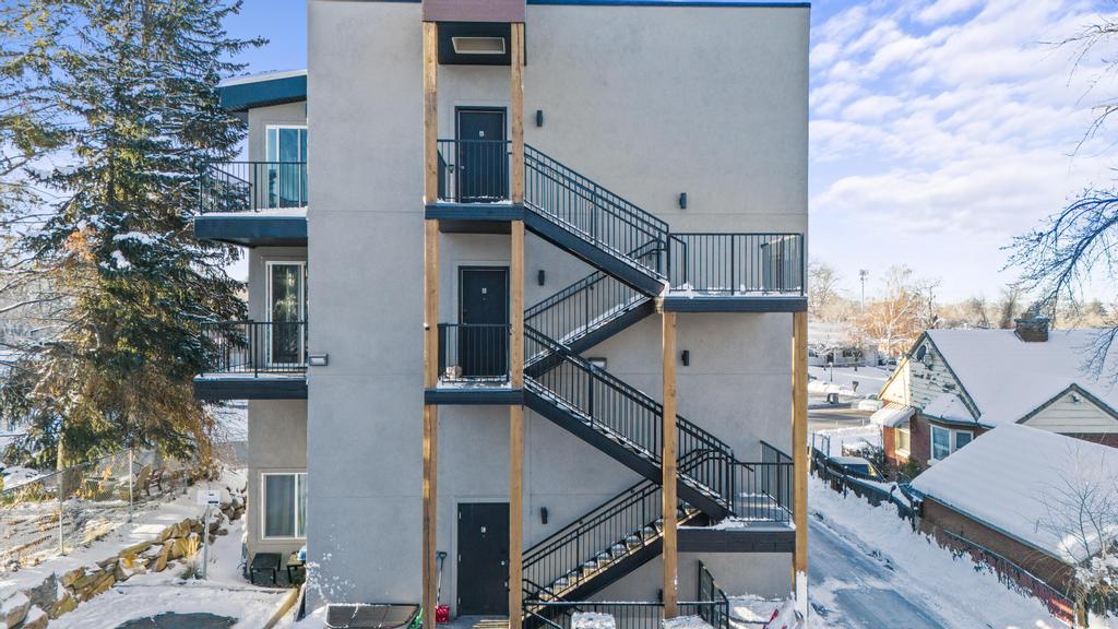 Snow covered building with stairs