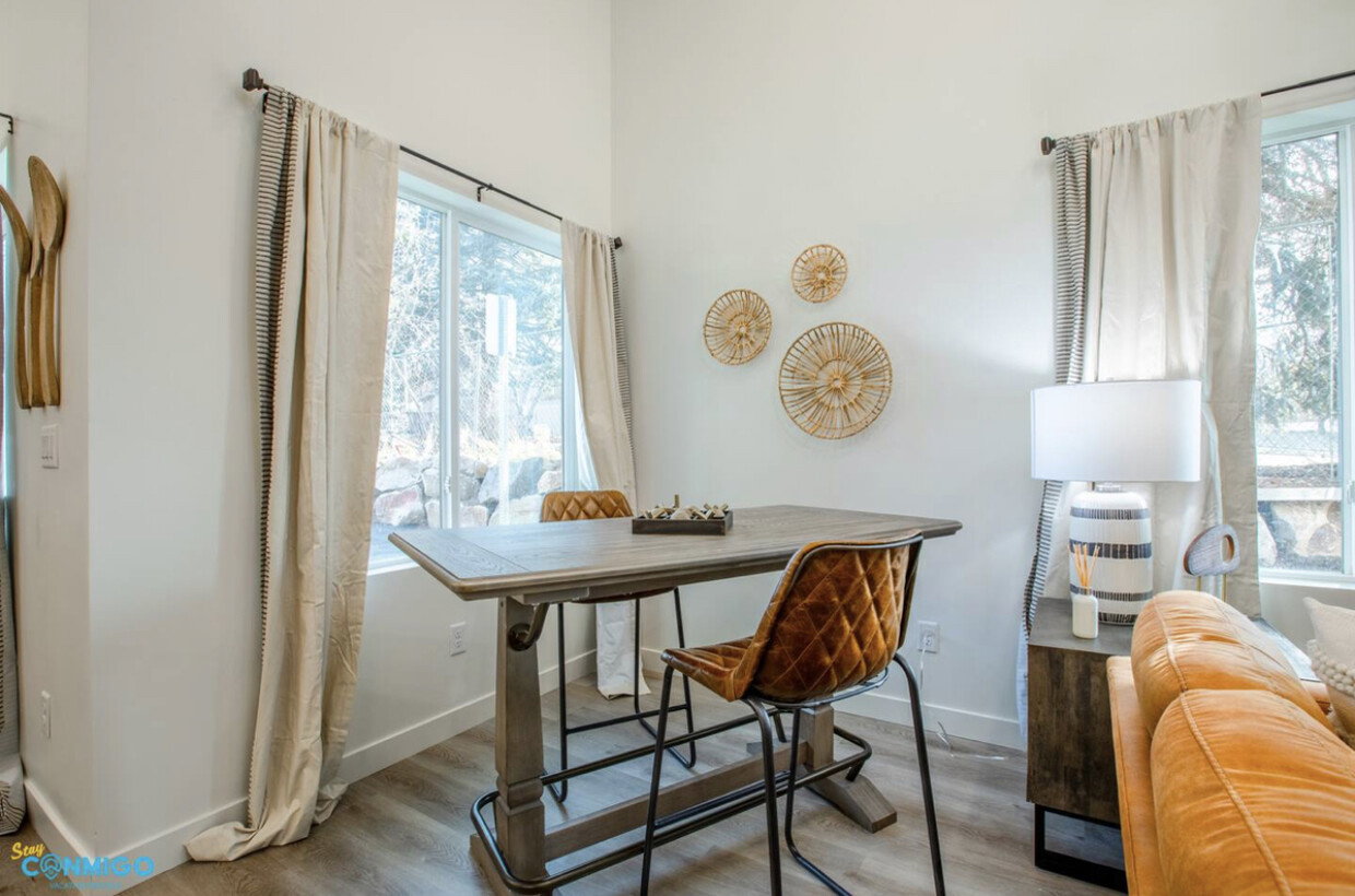 Dining room featuring baseboards and wood finished floors