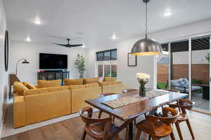 Dining area with pendent lighting.