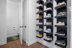 Mudroom with half bathroom.