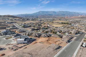 Birds eye view of property with a residential view and a mountain view