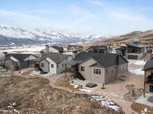 Drone / aerial view with a mountain view and a residential view