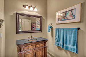 Bathroom with baseboards and vanity