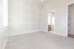 Unfurnished room featuring recessed lighting, baseboards, and light colored carpet