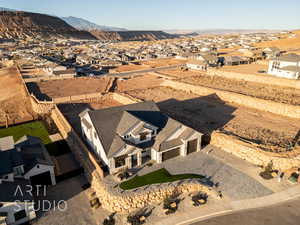 Drone / aerial view featuring a mountain view and a residential view