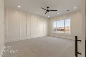 Empty room with visible vents, baseboards, light colored carpet, ceiling fan, and recessed lighting