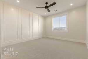 Empty room with recessed lighting, light colored carpet, a ceiling fan, baseboards, and visible vents