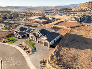 Birds eye view of property featuring a mountain view and a residential view