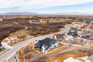 Birds eye view of property with a residential view and a mountain view